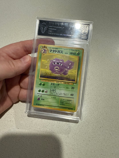 Weezing 110 the mystery of the fossils TCG 8.5